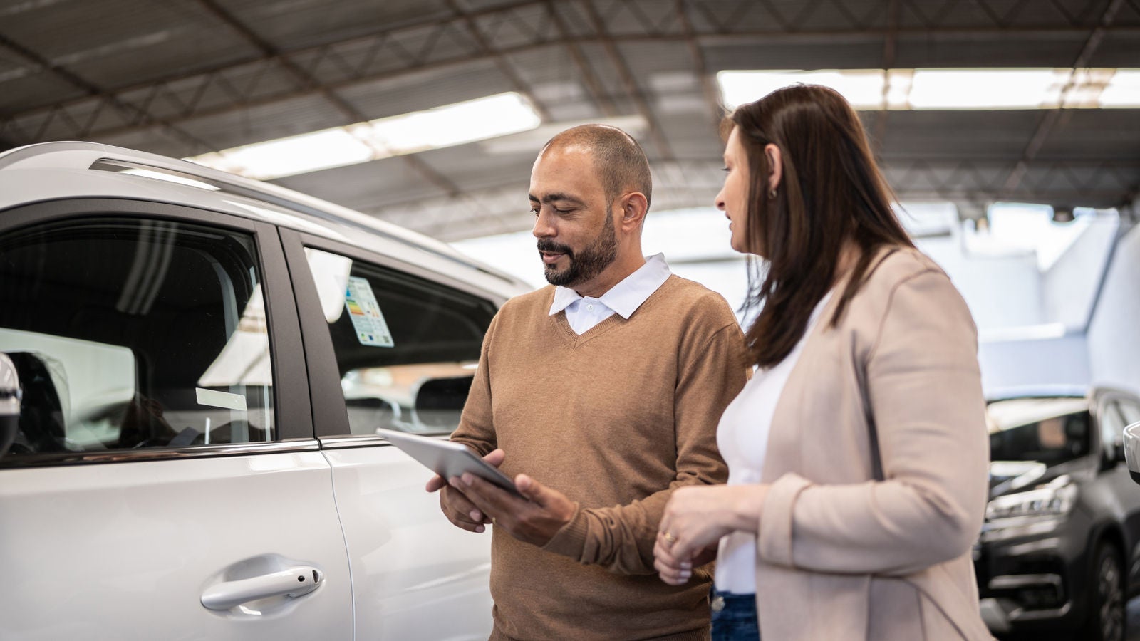 Is it better to buy sales a used car from a dealership