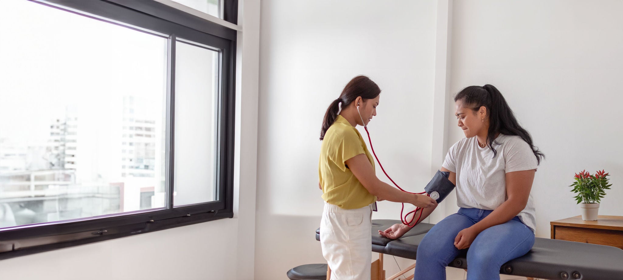 Nurse taking a patient's blood pressure