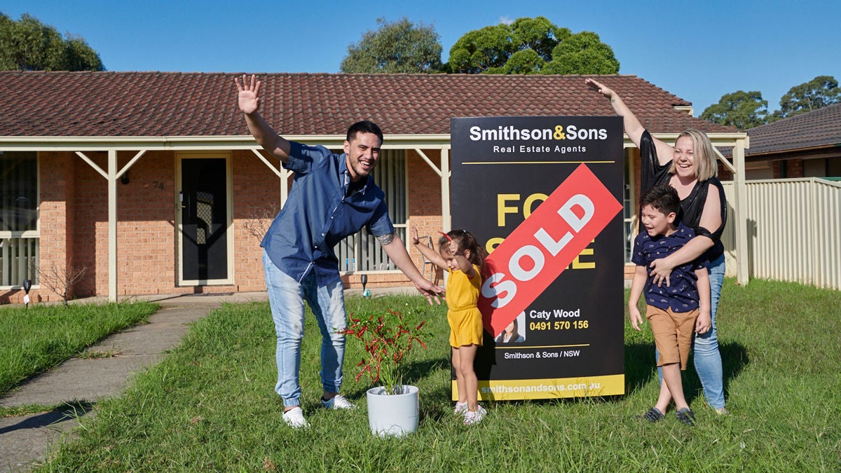 Family enjoying property bought at auction